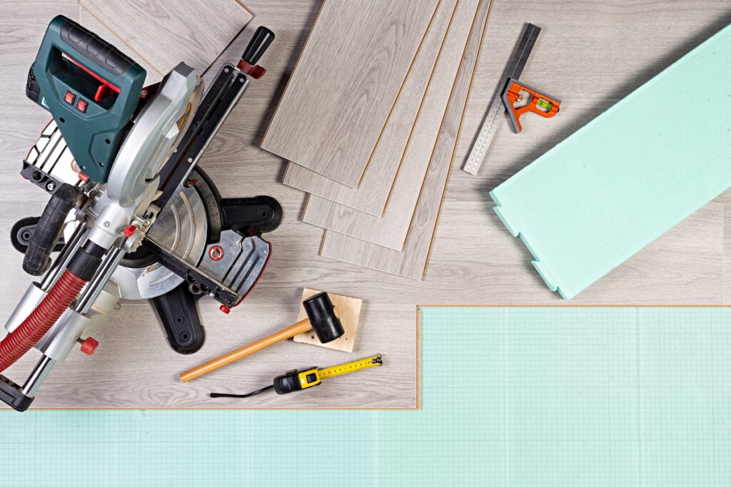 laying new wood flooring boards