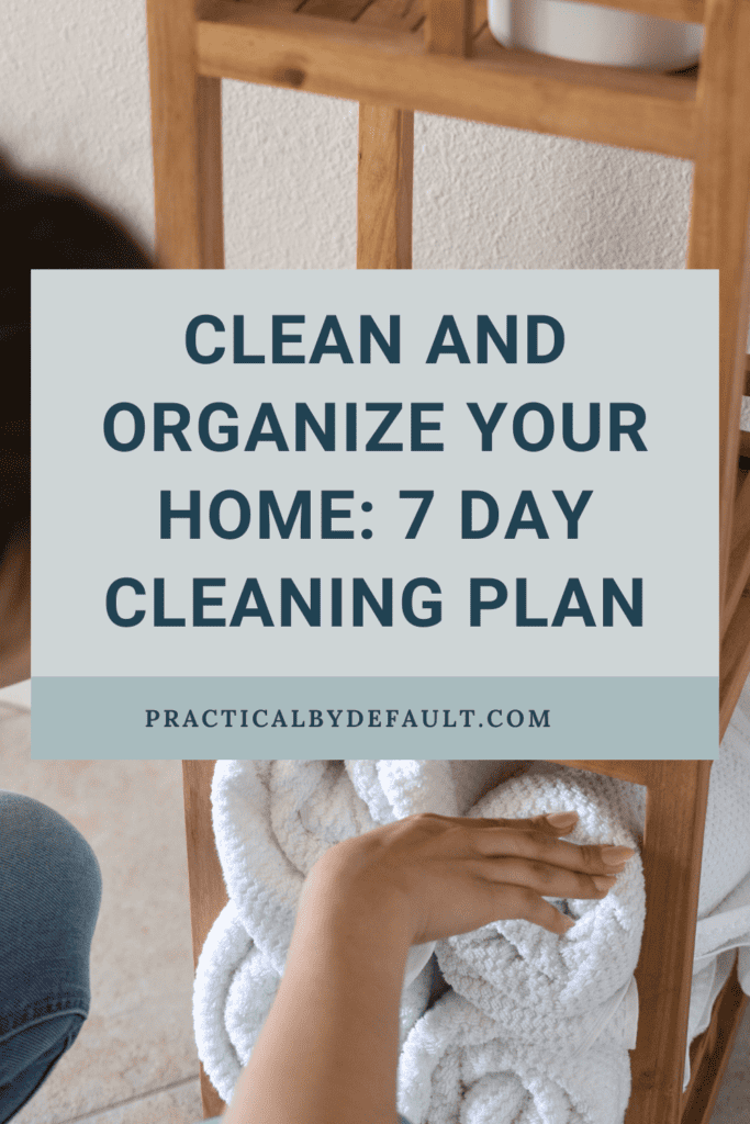 woman folding and putting away towels