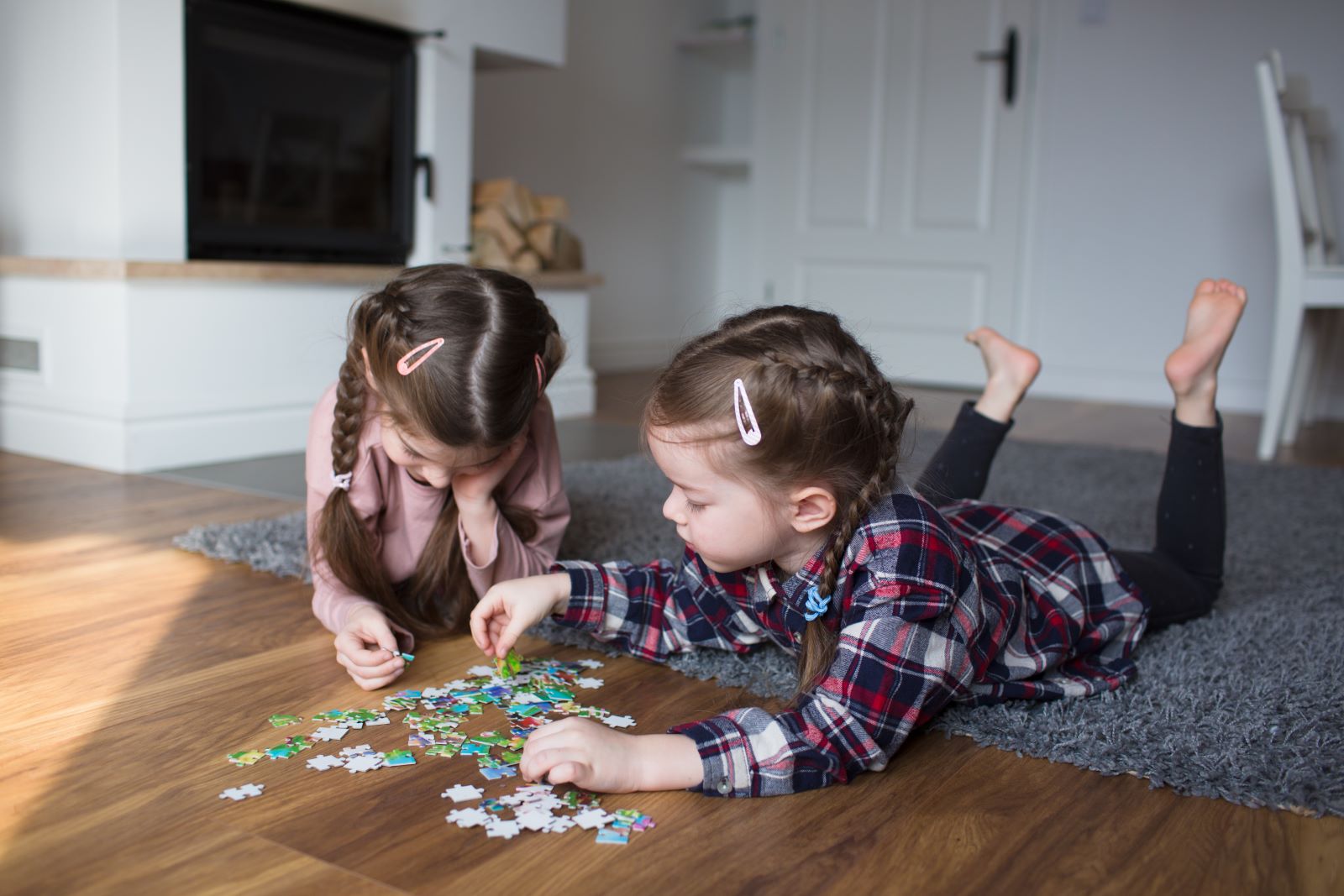 Kids Doing A Puzzle