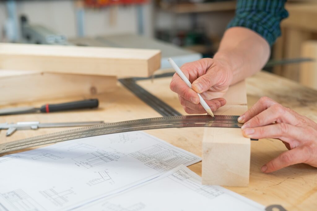 measuring wood for cutting