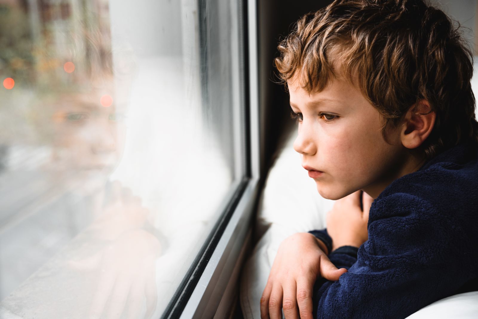 Kid Looking At The Window