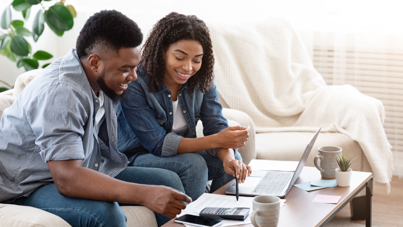 Couple Budgeting Money Working Together