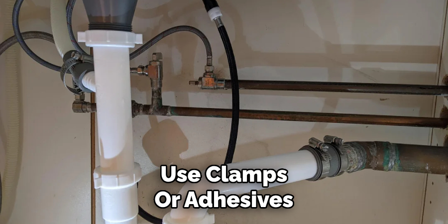 Use Clamps
Or Adhesives