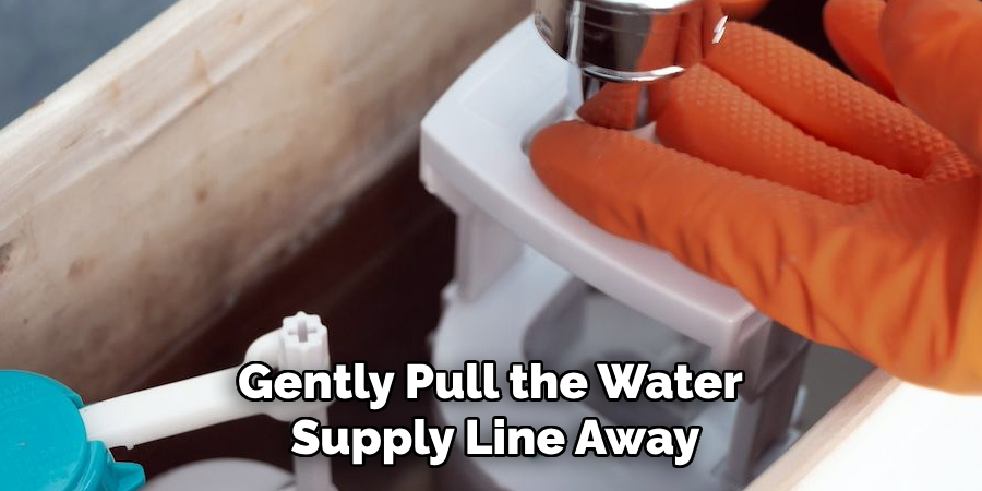 Gently Pull the Water
Supply Line Away