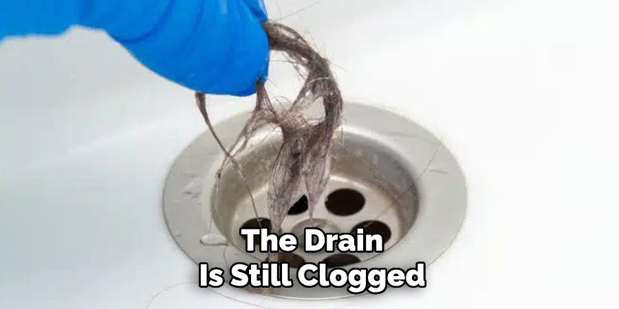 The Drain
Is Still Clogged