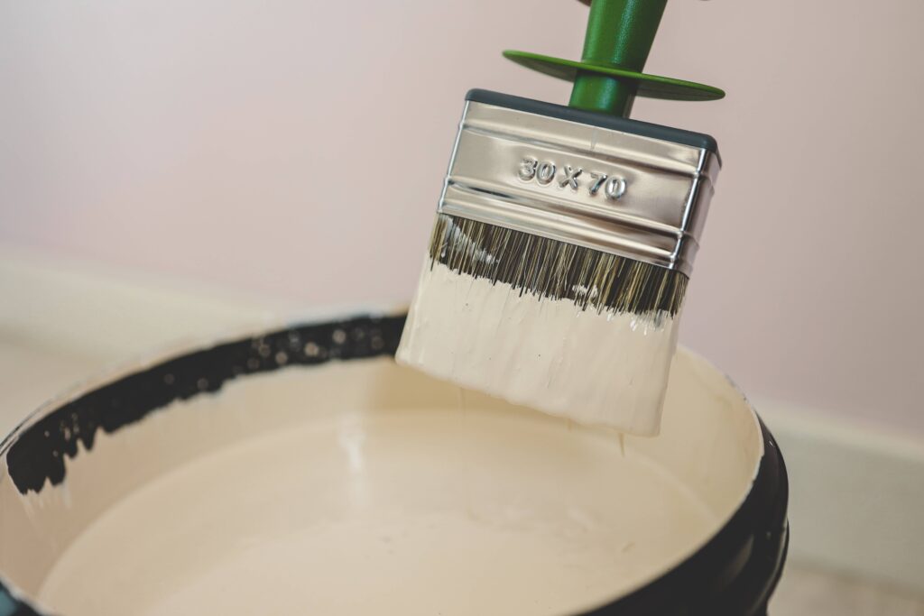 wall paint and paint brush