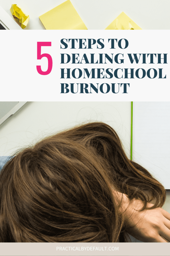 Woman with her head down on desk.