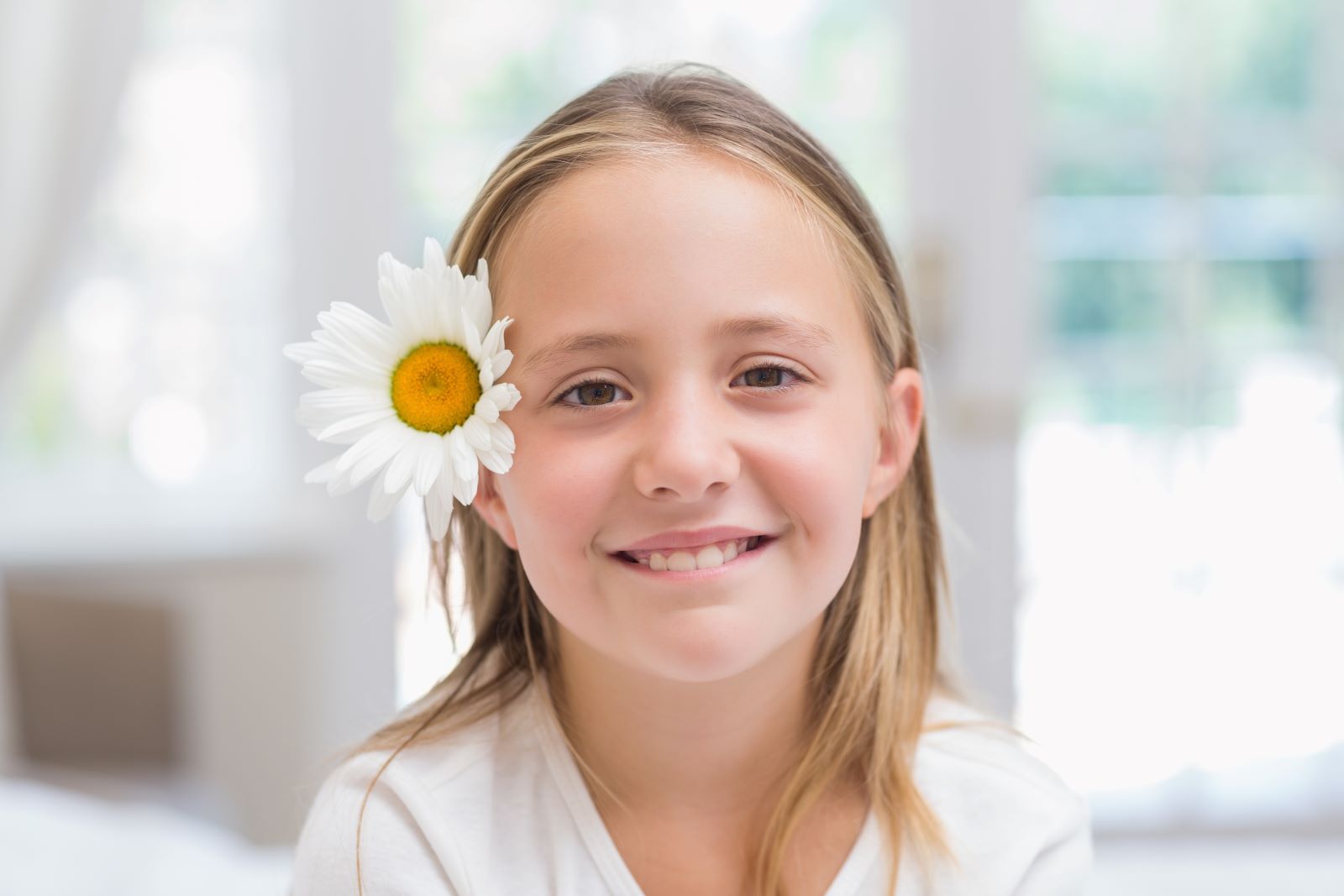 Smiling Girl With Flower