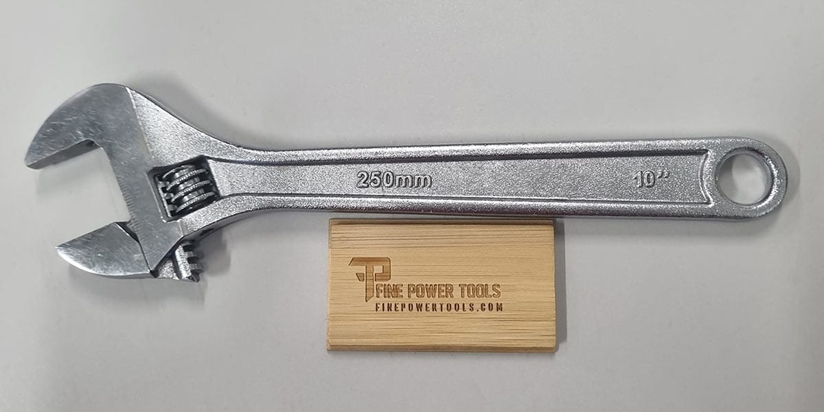 A 10-inch Adjustable wrench on white table