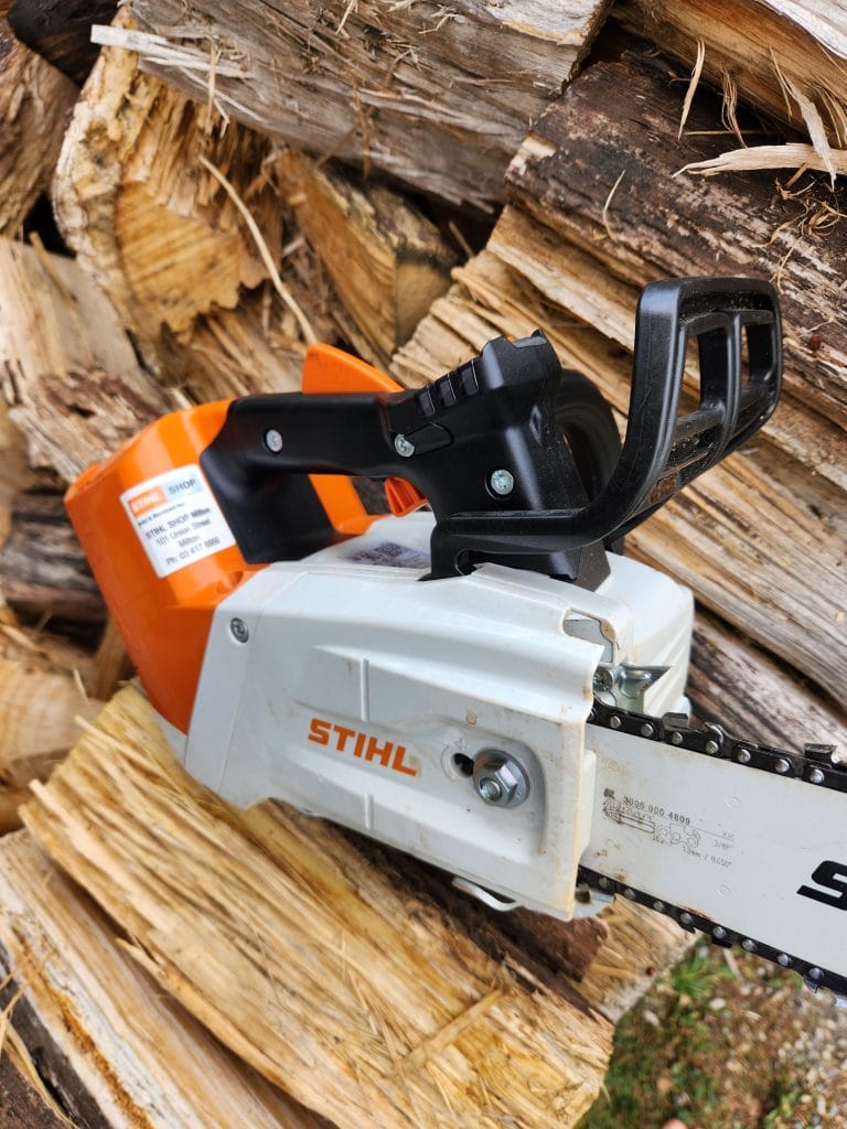 using the stihl top handle chainsaw