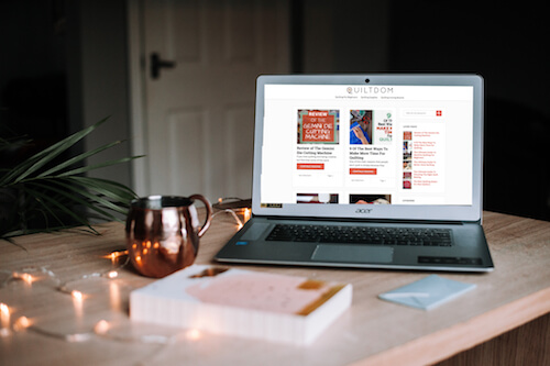 computer sitting on desk quilting blogs