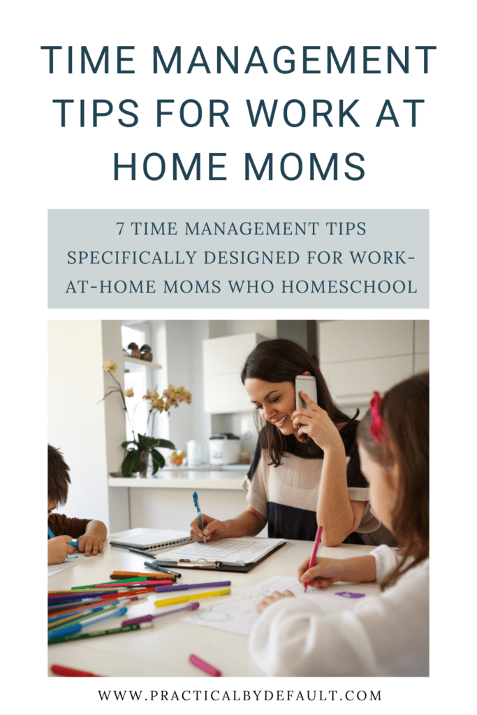 Work at home mom working at the table while homeschooling her kids