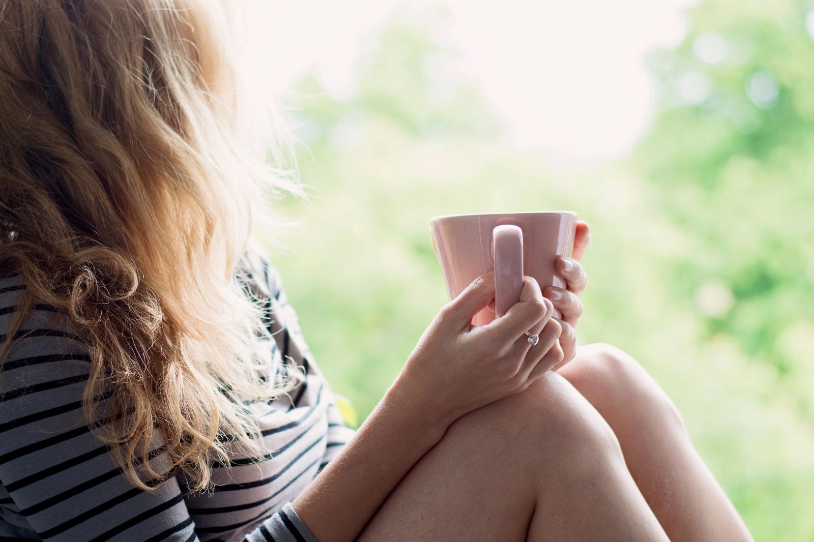 Girl Holding Cup