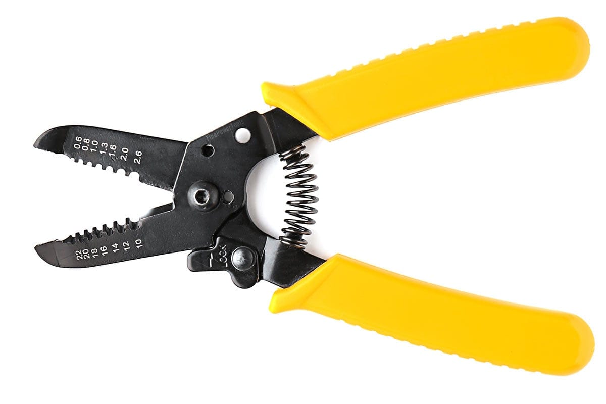 Wire stripper on white background